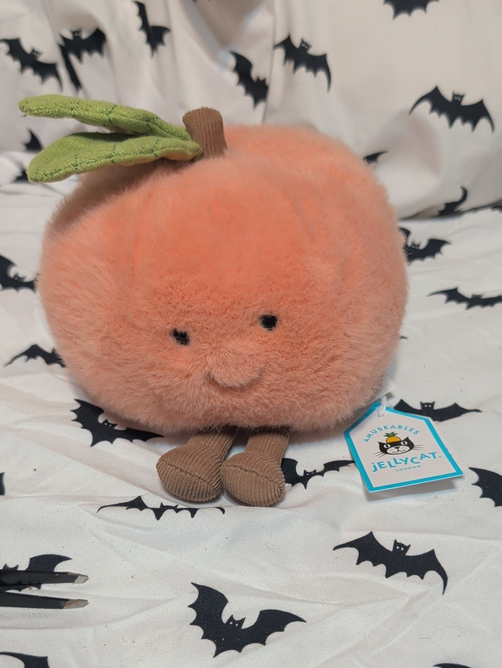 Jellycat Peach Plush - Soft Coral Peach with Green Leaves and Brown Legs
